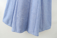 Robe midi décontractée et élégante pour femme, nouvelle collection 2026, avec col à revers, ceinture décorative, style rétro chic et manches bouffantes.
