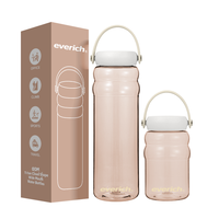 Bouteille d'eau simple de couleur personnalisée avec bouteille d'eau publicitaire créative avec poignée portable