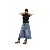 Marque rétro américaine Pantalon trois-quarts pour femmes Haut décontracté Denim Jeans Bouton Décoration Été Vintage Style Whisker Straight