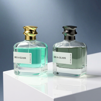 Flacon de parfum unique de 100 ml, fond épais, forme irrégulière, couvercle en zamac, finition transparente, flacon en verre rechargeable avec emballage cadeau