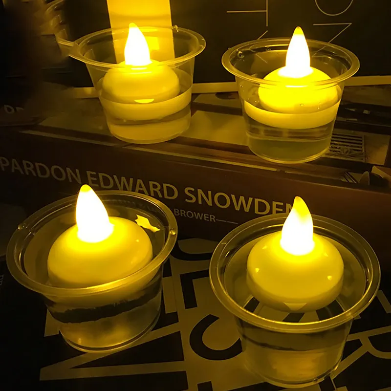 Candele impermeabili illuminate ad acqua nuove candele galleggianti elettroniche senza fiamma a Led