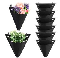 Nouveau pot de fleur en triangle noir non tissé transfrontalier sac suspendu balcon intérieur créatif suspendu mur panier de fleurs pot de plante