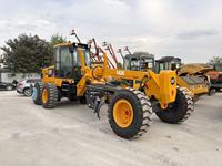 Niveleuse à moteur Caterpillar d'occasion CAT 140K avec une masse opérationnelle de 15 tonnes et un moteur puissant de 128 kW