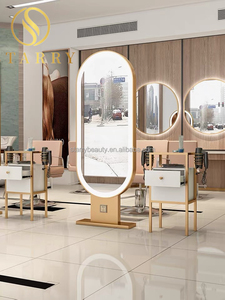 Miroir de coiffure ovale de luxe moderne et durable en fer avec éclairage LED et cadre doré pour hôtels et supermarchés - Product Image 2