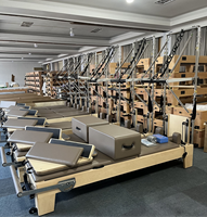 Prix d'exercice professionnel Lits Équipement en bois Vente Trapèze Reformer Pilates Machine avec tour