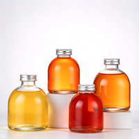 Bouteilles en verre à épaules rondes avec bouchons argentés pour vin, whisky, brandy, jus et présentation à domicile