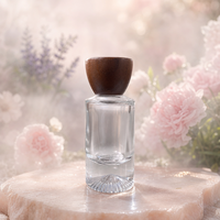 Flacon de parfum rechargeable de luxe en verre transparent rond de qualité supérieure, avec bouchon en bois et fond épais, personnalisable OEM
