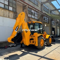 Chargeuse-pelleteuse sur pneus JCB 4CX d'occasion avec déplacement latéral, moteur 4.4L et boîte de vitesses, garantie 1 an