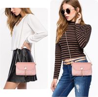 Sac à main bandoulière élégant en cuir véritable avec pompons en forme de chat, fermeture éclair unique, pochette à chaîne mignonne
