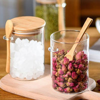 Pot de conservation alimentaire en verre recyclable et écologique fait à la main avec couvercle et cuillère en bambou pour la préservation de la fraîcheur
