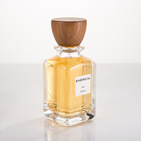 Bouteille de parfum en verre transparent de haute qualité boîte-cadeau 30ml 50ml 100ml parfum en gros avec couvercles en plastique de pulvérisation de pompe