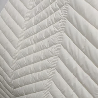 Tissu matelassé imperméable en coton avec motif floral mat épaissi, nouveau tissu en maille de type usine source pour vestes matelassées