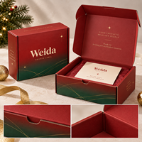 Boîte d'expédition pliable en carton imprimé sur mesure avec motif artistique dégradé rouge-vert et ligne dorée, pour emballage de marque saisonnier