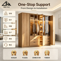 Armoire de chambre en bois avec portes vitrées, éclairage LED, tiroirs, tringle de suspension et grand espace de rangement pour la maison et les projets hôteliers