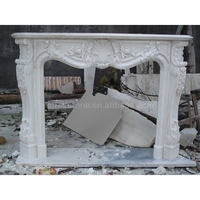 Cheminée d'intérieur de style européen sculptée à la main Cheminée en marbre blanc décorative autoportante Style de designer