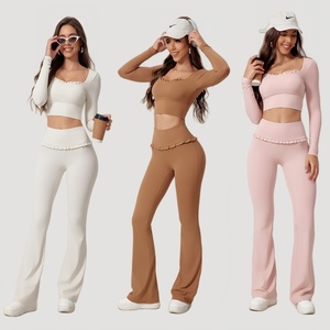 ชุดออกกำลังกายโยคะ 2 ชิ้น เสื้อครอปแขนยาวแต่งขอบลูกไม้ กางเกงขาบานเอวสูงพับได้ ชุดออกกำลังกายสำหรับผู้หญิง - Product Image 1