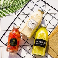 Nuevo diseño portátil redondo Boca Grande 8oz 12oz 16oz botellas de vidrio de leche para paquete de jugo
