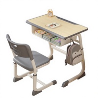 Ensemble bureau et chaise compact réglables en hauteur pour étudiants, mobilier scolaire durable en acier avec plateau de rangement pour l'apprentissage des enfants