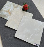Carrelage en porcelaine effet marbre onyx rose, jaune, beige, brillant, 60x60, vente en gros, prix bas, pour sols intérieurs
