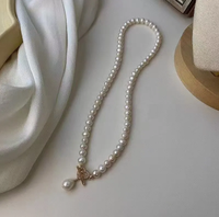 Collier classique intemporel avec fermoir en forme de cœur