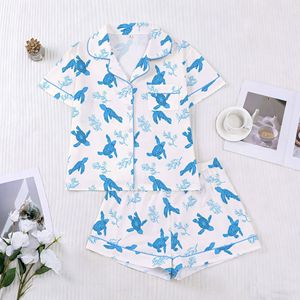 Conjunto de Pijama de Verano para Mujer con Estampado de Tortuga Marina y Coral Oceánico, Ribete en Contraste Azul, Cuello con Muescas y Manga Corta - Product Image 1