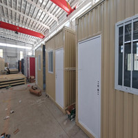 Maisons modulaires préfabriquées de luxe de 20 pieds Tente de conteneur plat préfabriquée Maison mobile Bureau à double porte Bâtiments faciles à utiliser en magasin