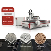 Routeur CNC 3 axes 1325 personnalisé à succès avec broche simple et pompe pour la sculpture 3D de meubles et portes d'armoires