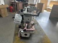 Machine à coudre ST 008-12064P/VPL à 12 aiguilles pour l'application de rubans sur les vêtements de sport