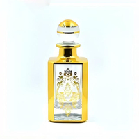 Vente en gros de bouteilles vides de parfum gravées aux UV de 250ml bouteille d'affichage de parfum plaqué or bouteille de parfum de luxe personnalisée