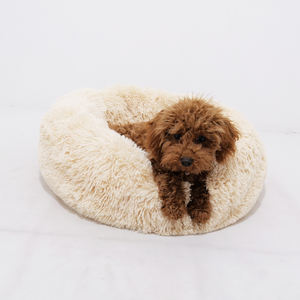Yangyangpet suave calentamiento felpa tela perro mascota cama barata al por mayor Donut cama con patrón sólido calmante para perros - Product Image 1