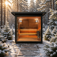 Sauna extérieur en bois carbonisé de style moderne et traditionnel avec poêle