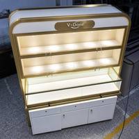 Vitrine à bijoux haut de gamme avec dessus incurvé, verrouillable, en verre, avec tiroir et armoire de rangement