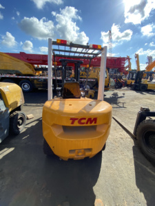 TCM 3 Ton <b>Used</b> Diesel Internal Combustion Forklift Solid Tire Three Stage Mast 3254mm Fork Length 4WD Rough Terrain Manual - Product Image 2
