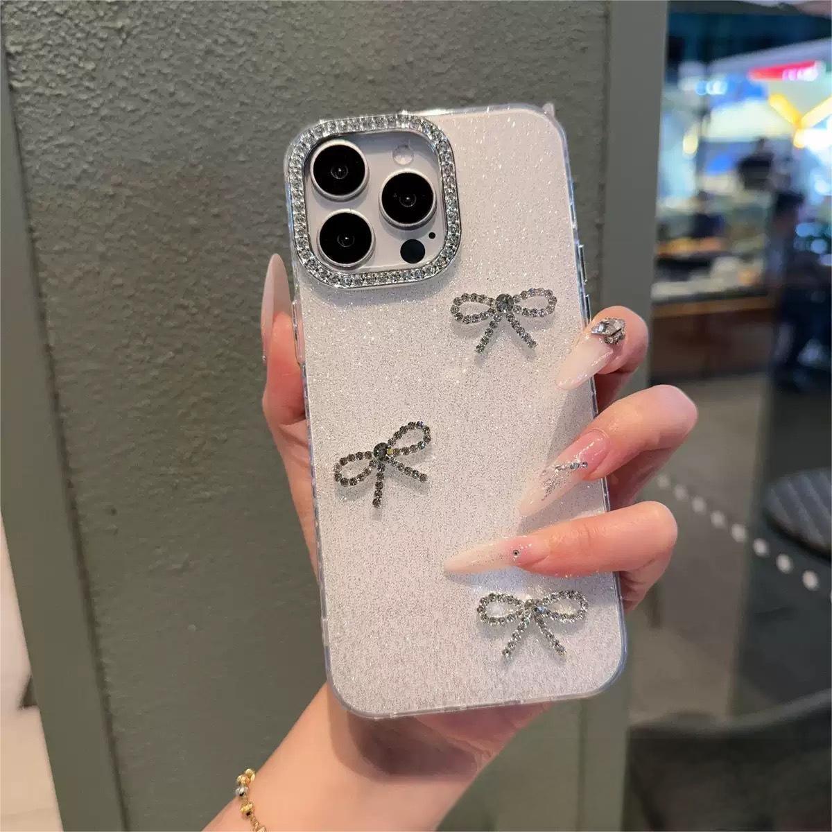 White glitter with three butterfly rhinestones