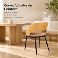 Chaise de salle à manger élégante avec dossier incurvé rembourré en tissu beige et pieds en métal noir pour mobilier de restaurant de type boutique, démontable, OEM/ODM