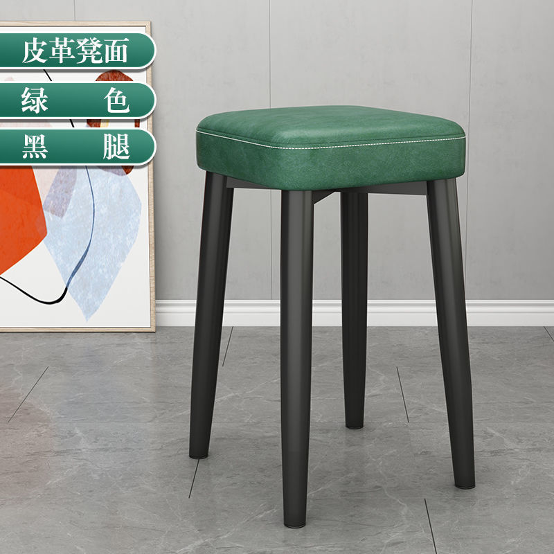 Latex version (thick all-black legs) with green leather