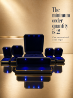Boîte à bijoux LED noire octogonale à bord doré en gros, boîte à bijoux LED noire pour la vente au détail, boîte à bijoux LED noire octogonale à bord doré en stock