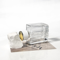 Bouteille en verre de forme unique de haute qualité, bouteille d'huile essentielle de 100 ml, flacons de parfum transparents, atomiseur, flacons pulvérisateurs