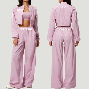 Ensemble de yoga pour femmes : Sweat-shirt ample à manches longues avec cordon de serrage à la taille et fermeture éclair intégrale, et pantalon de survêtement taille haute à jambes larges - Product Image 1
