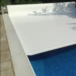 DIY custom made automatic pool safety covers cut heating cost