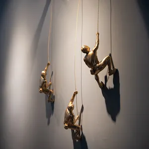 Modern design home decor hanging resin climbing man wall sculpture
