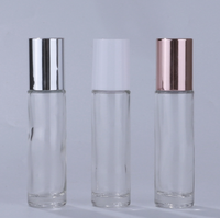 Flacon de parfum en verre transparent de 5 ml et 10 ml avec bouchon noir et applicateur à bille