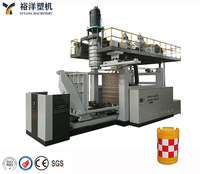 Machine d'extrusion-soufflage de plastique à configuration équilibrée et pratique pour la fabrication de barrières routières en PEHD de 2 m