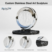 Sculpture circulaire en acier inoxydable poli miroir, texture ondulée, installation artistique abstraite pour place publique, fabrication sur mesure