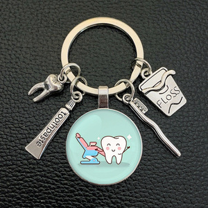 Porte-clés en forme de dent mignon et beau cadeau populaire dans la clinique d'orthodontie dentaire <span class=keywords><strong>tout</strong></span> <span class=keywords><strong>le</strong></span> <span class=keywords><strong>monde</strong></span> aime - Product Image 6