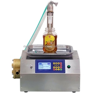 เครื่องบรรจุอัตโนมัติขนาดเล็กสำหรับของเหลวข้นหนืด เช่น น้ำผึ้ง น้ำมันปรุงอาหาร น้ำมันหมู ซอสช็อกโกแลต น้ำเชื่อม น้ำมันเกียร์ - Product Image 1