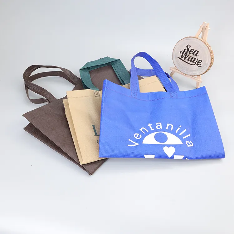 不織布バッグ生地はカラフルなデザインを受け入れますサンプル注文エコ素材ハンドル不織布バッグ