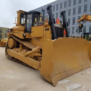 รถดันดินตีนตะขาบ CAT D9R สีเหลือง พร้อมเครื่องยนต์คัมมินส์ กำลัง 250 กิโลวัตต์ ความสามารถในการดันดิน 10 เมตร - Product Image 1