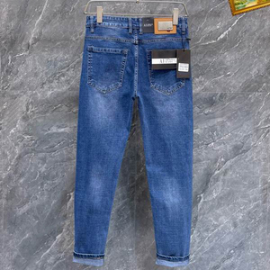 Offre Spéciale jeans slim délavés de couleur unie de haute qualité avec trou blanc pour hommes - Product Image 6
