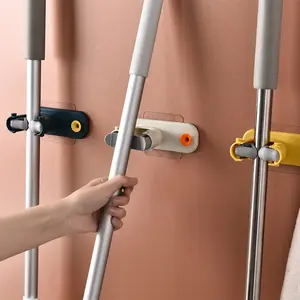 Supporto per scopa personalizzato senza punzonatura cucina installazione di perforazione multifunzionale supporto per scopa a parete Clip per Mop da bagno in plastica